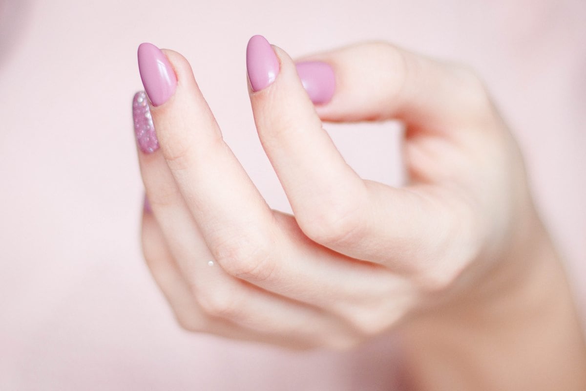 A modern pink press-on manicure