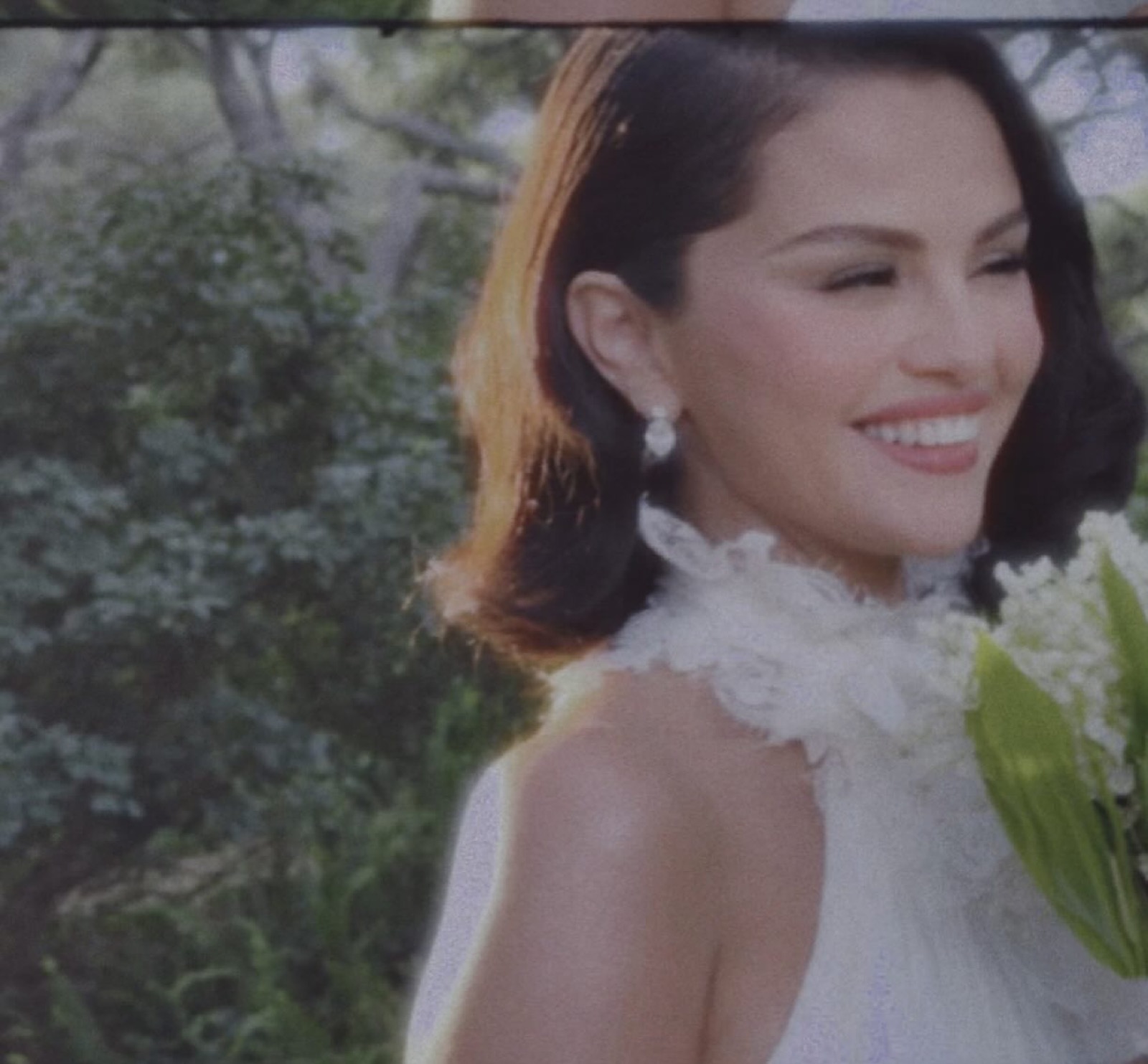 Selena Gomez on her wedding day with soft rosy makeup by Hung Vanngo
